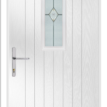 White door with decorative glass panel on a white background