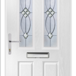 White door with decorative glass panels and a mail slot