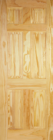 Wooden door with a natural finish and visible grain pattern