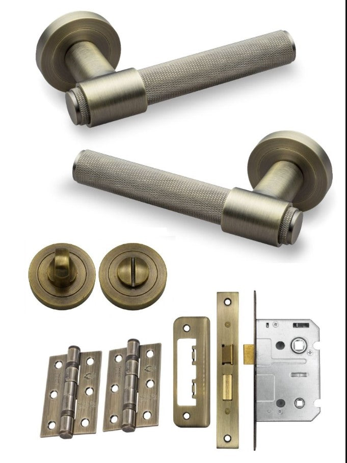 FLARE KNURLED DOOR HANDLE ON ROSE – BATHROOM PACK – ANTIQUE BRASS