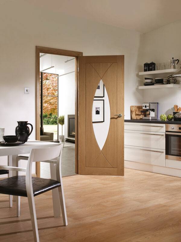 Modern kitchen with wooden door and open interior view