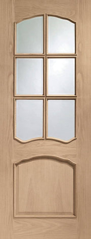 Wooden door with glass panels
