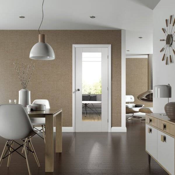 Modern interior of a living room with a dining area.