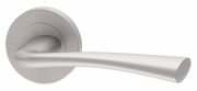 Silver door handle on a light gray background