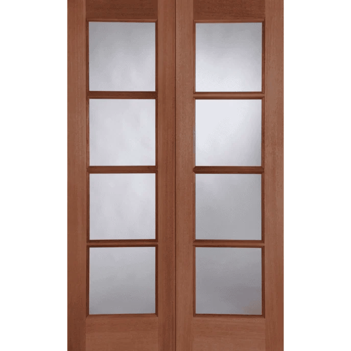 Wooden door with glass panels on a green background
