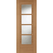 Wooden door with glass panels on a white background