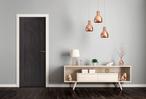 Modern interior design with a door, sideboard, and pendant lights.