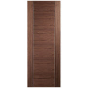 Wooden door with a dark brown finish on a white background