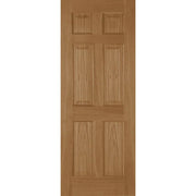 Wooden door with a six-panel design on a white background