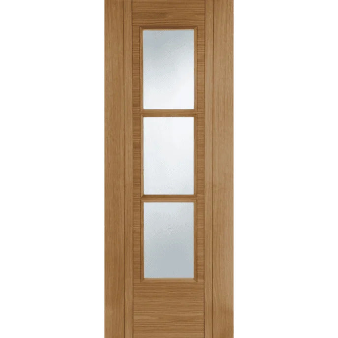 Wooden door with three glass panels on a white background