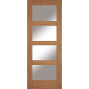 Wooden door with glass panels on a white background