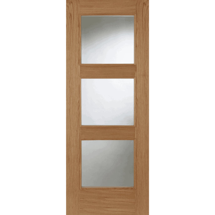 Wooden door with three glass panels on a white background