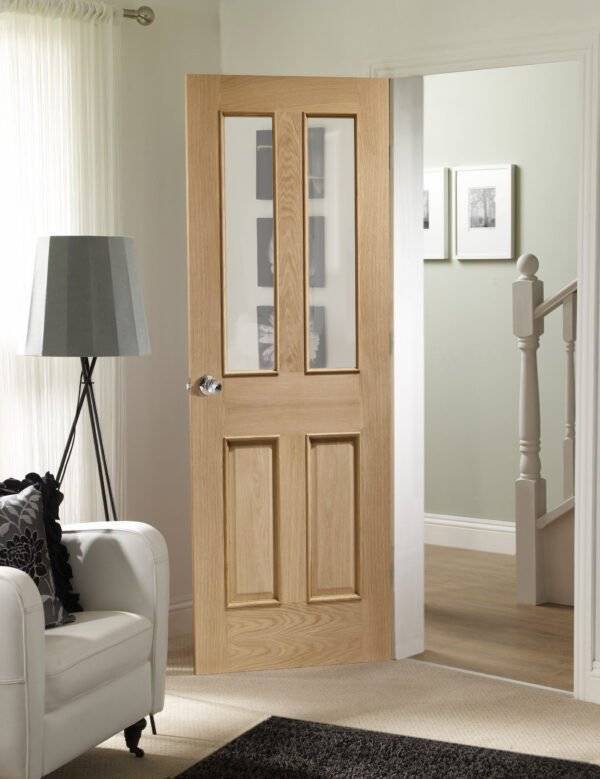 MALTON WITH RAISED MOULDINGS INTERNAL OAK DOOR WITH CLEAR BEVELLED GLASS