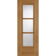 Wooden door with three glass panels on a white background
