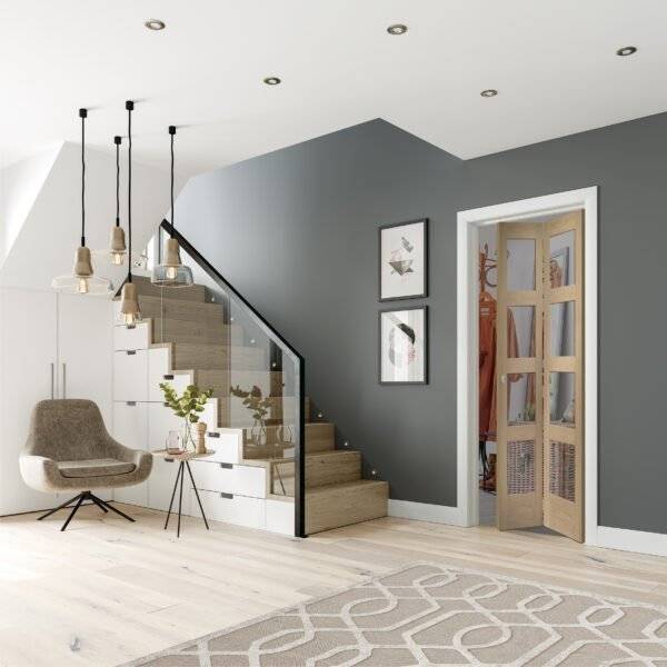 Modern interior design of a living room with gray walls, wooden staircase, and decorative elements.