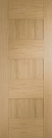Wooden door with a paneled design