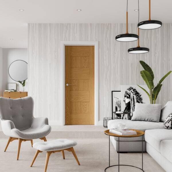 Modern living room with gray armchair, white sofa, and wooden coffee table.