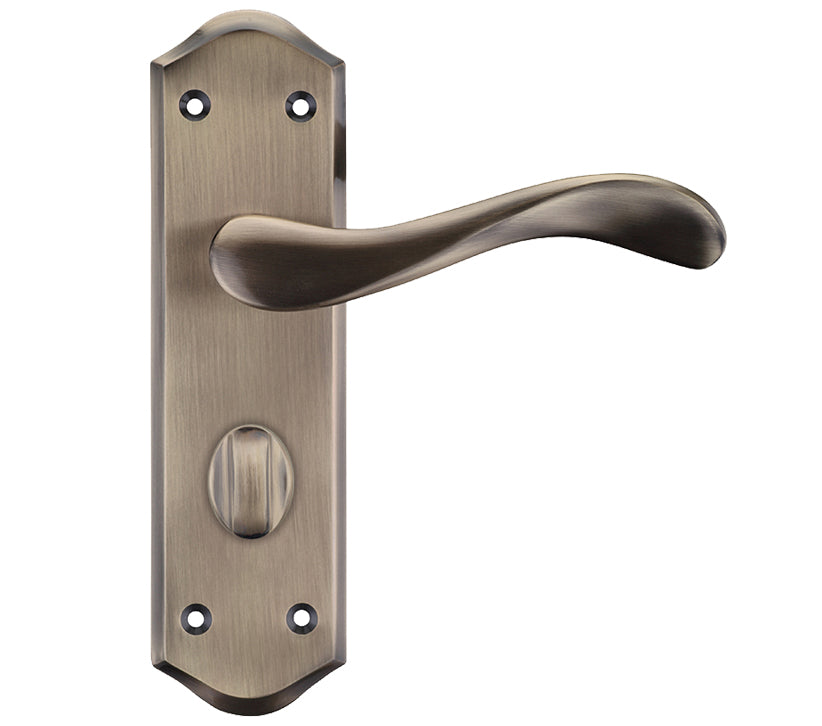 Bronze door handle on a white background