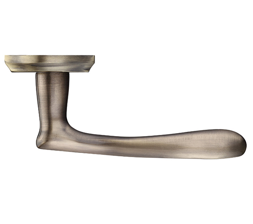 Metal door handle on a white background