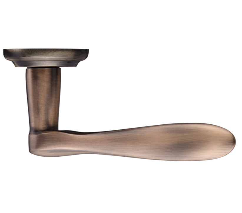 Bronze door handle on a white background