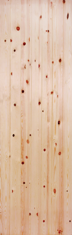 Close-up of a unfinished redwood door with visible grain and knots