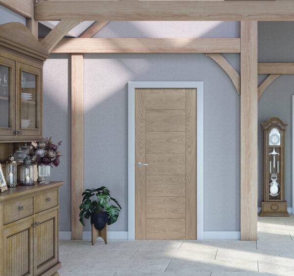 Wooden interior door in a room with wooden furniture and decor.