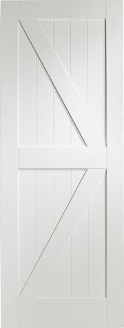 White wooden door with geometric design