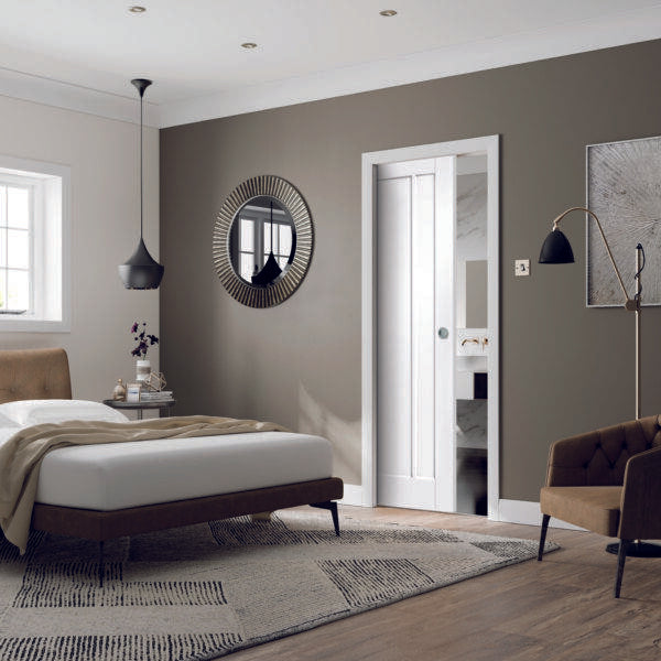 Modern bedroom with gray walls, a bed, and decorative elements.