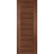 Wooden door with a dark brown finish on a white background