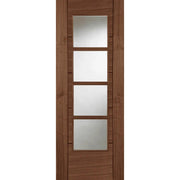 Wooden door with glass panels on a white background