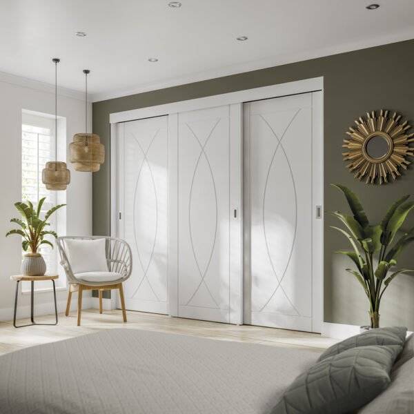 Modern bedroom with white sliding doors, gray walls, and decorative elements.