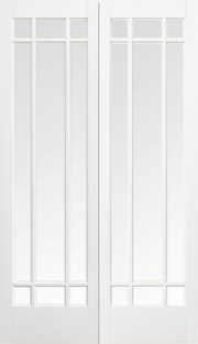 White interior door with glass panels on a white background