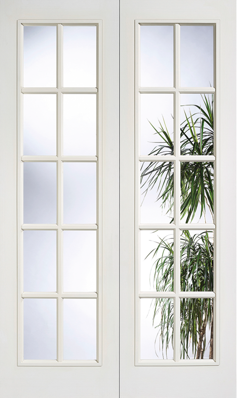 White French doors with glass panels and a plant reflection
