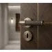 FLARE KNURLED DOOR HANDLE ON ROSE – LOCK PACK – ANTIQUE BRASS
