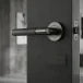 MARINO KNURLED DOOR HANDLE ON ROSE – LATCH PACK – BLACK NICKEL