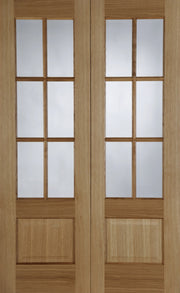 Wooden double door with glass panels